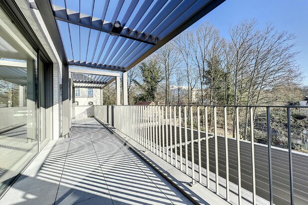 Penthouse neuf de ± 180 m² + terrasse de ± 36 m², 3 ch + poss. pk