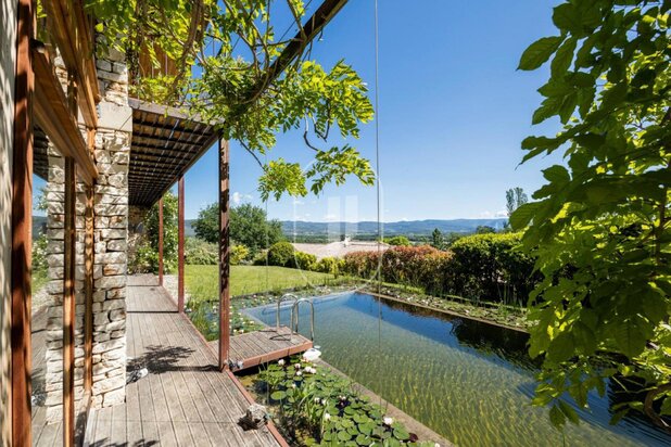 Stone bioclimatic house with pool for sale in Gordes